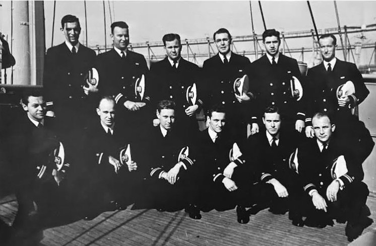 The crew of the USS Zircon. Stanley Simon, an orthopedic surgeon, is pictured at stage right, the person farthest left to the viewer, in the second row.